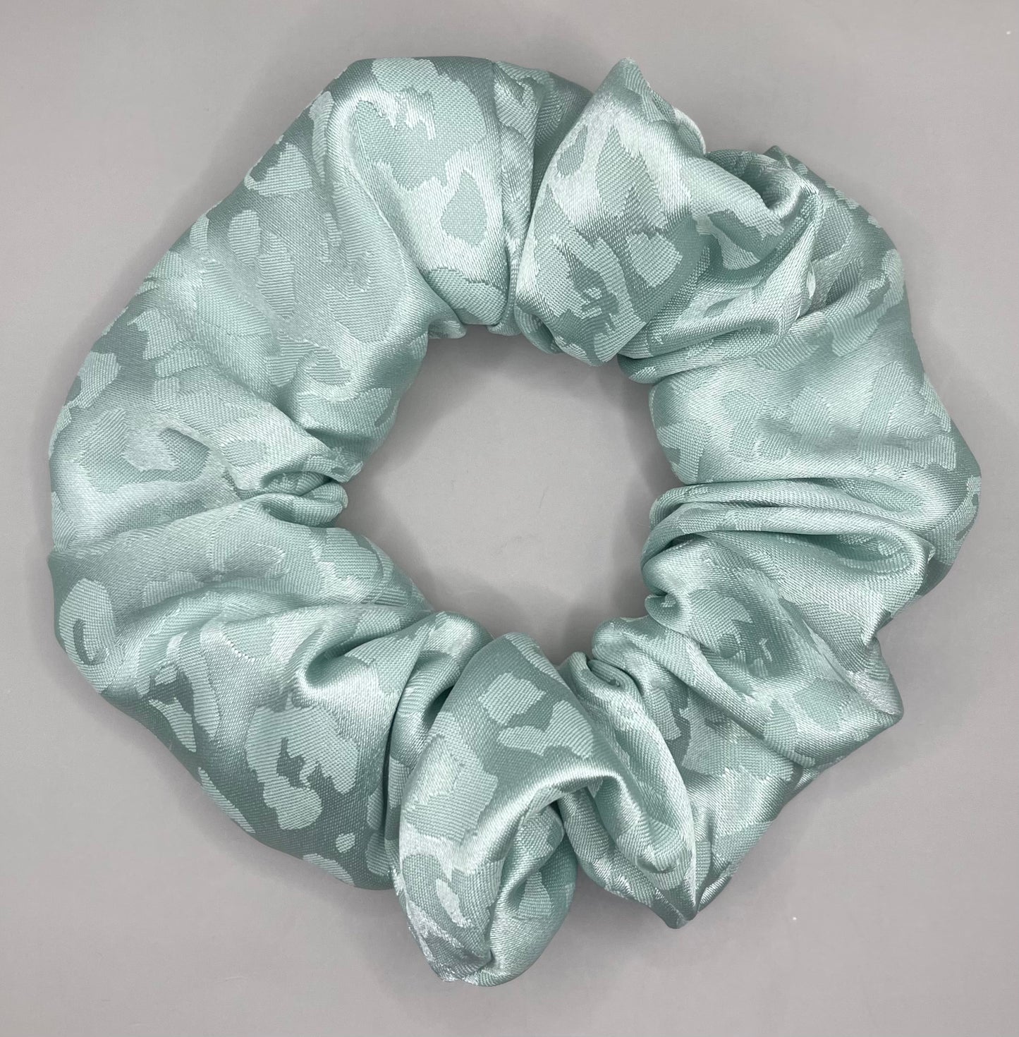Adult satin cheetah light blue